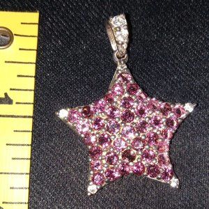 925 Sterling Silver Fancy Rhodolite Garnet Star Pendant.